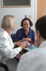 Doctors speaking with a patient