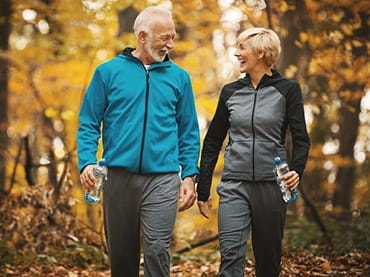 Image of two patients walking.