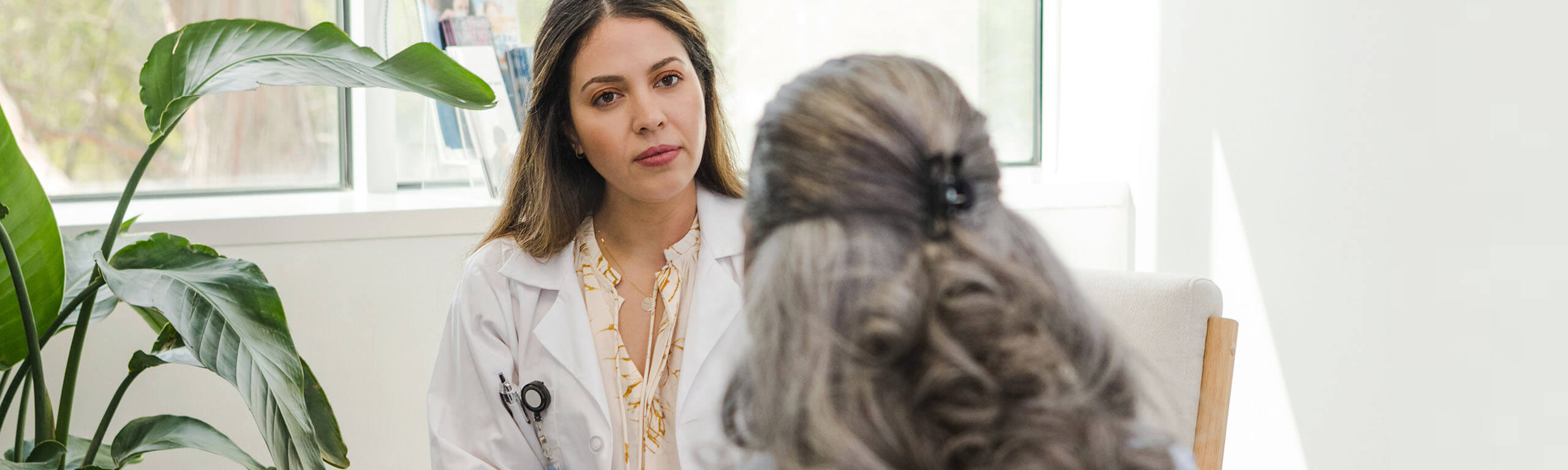 Doctor speaking with patient