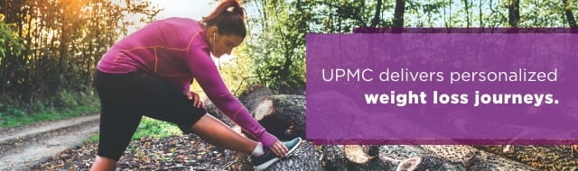 Image of woman stretching her leg in the woods preparing for a run with a banner that reads, UPMC delivers personalized weight loss journeys.