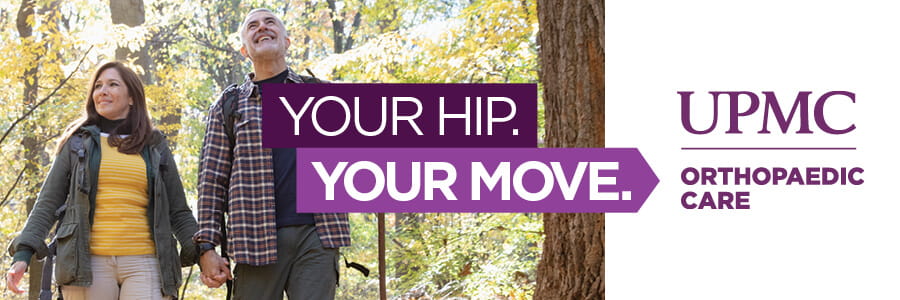 Image of couple holding hands hiking in the woods with the words, Your Hip, Your move. UPMC Orthopaedic Care.