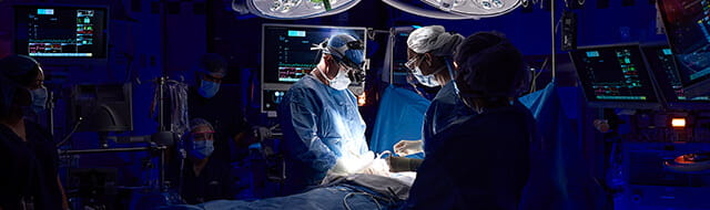Image of doctors performing surgery.