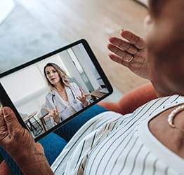 Patient has video visit with doctor on tablet