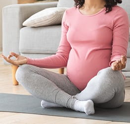 Pregnant woman doing yoga