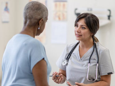 Patient talks with doctor