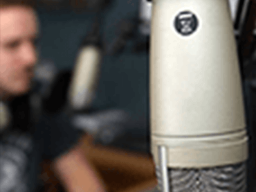 Craig ENT with a microphone