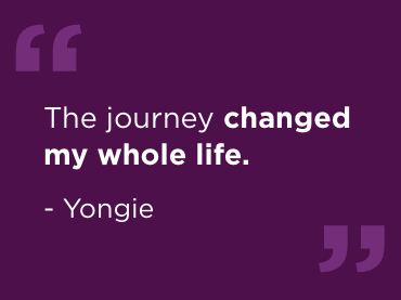 A purple background with white text which reads "The journey changed my whole life," by Yongie Lee.