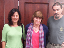 She poses with her family.