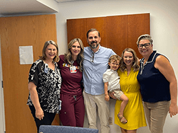 Kai with his UPMC care team